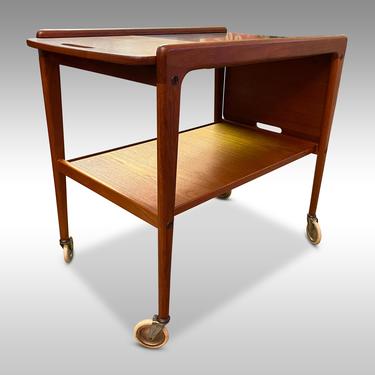 Swedish Teak Modern Bar Cart by Yngve Ekstrom, Circa 1960s - Please ask for a shipping quote before you buy. 