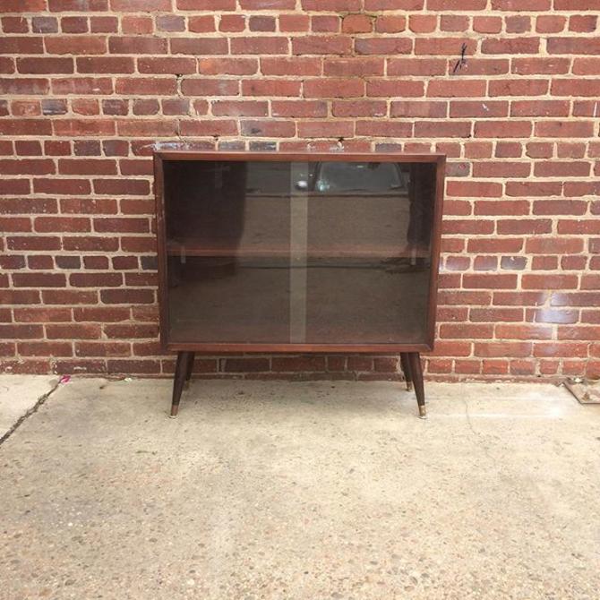 Small midcentury modern glass front storage / book shelf Off