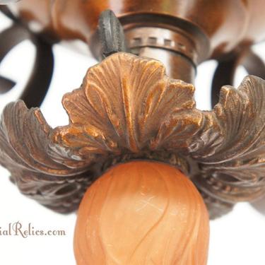 Brass and wrought iron ceiling fixture, circa 1920s
