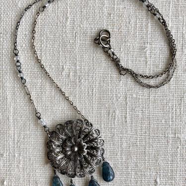 Rainy Days & Mondays [kyanite, 1930s silver filigree, sterling silver, moonstone] 