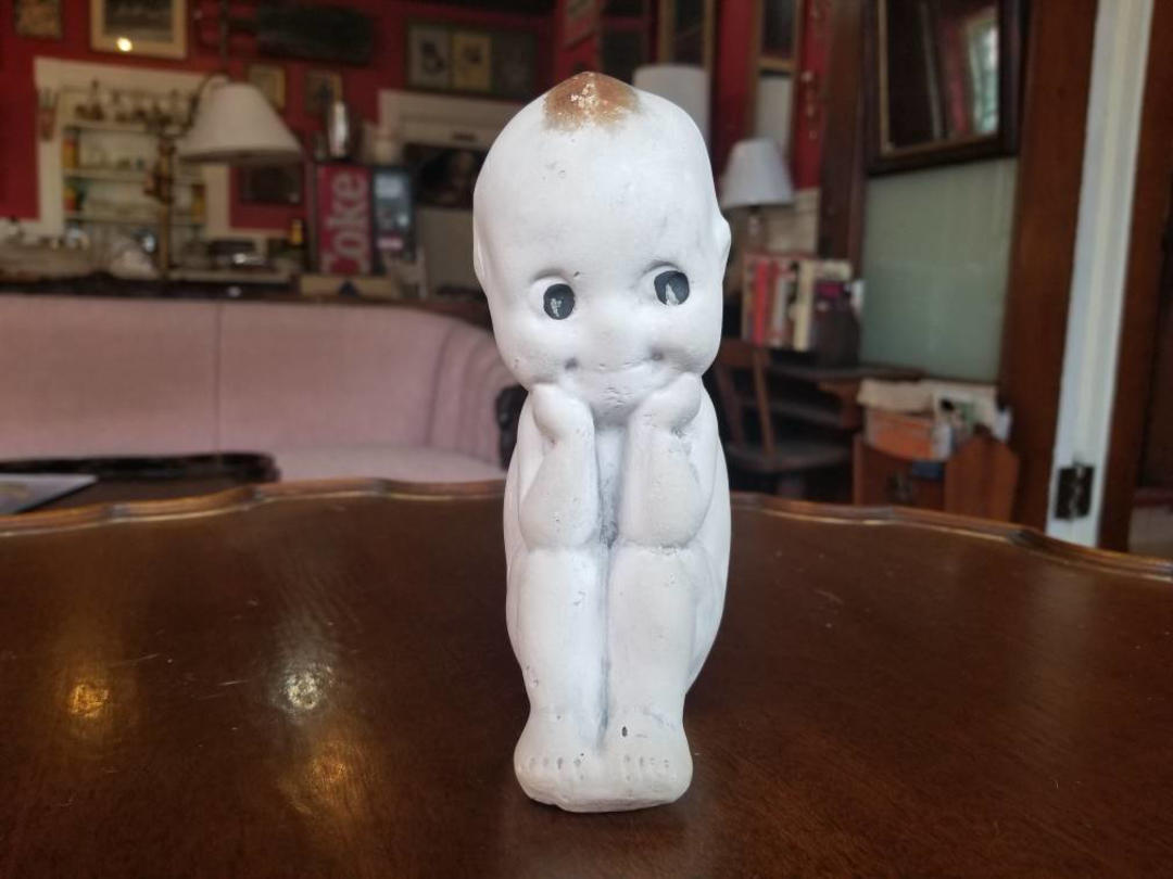 Chalkware kewpie doll online