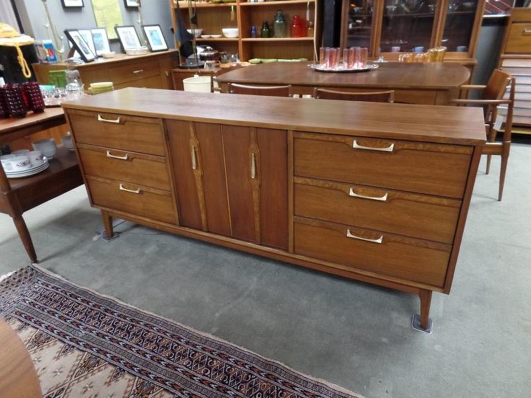 MidCentury Modern 9 drawer dresser with brass accents Peg Leg