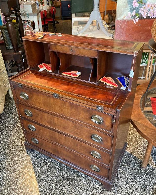 Genuine mahogany drop front petite secretary. Leather accents.  33” x 16.5” x40” open 33” x 25” x 40”