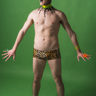 Man in leopard clearance speedo