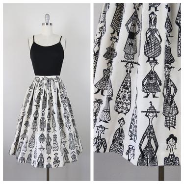 Vintage 1950s novelty print skirt, fit and flare, circle skirt, cotton, black and white, size xs 