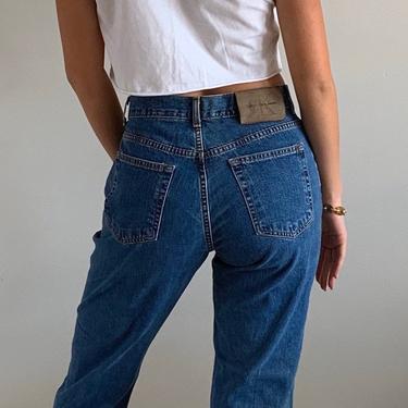90s Calvin Klein jeans / vintage CK Calvin Klein button fly high waisted relaxed faded jeans | 27 W 