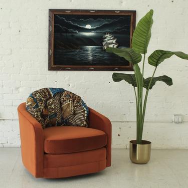 Burnt Orange Swivel Chair