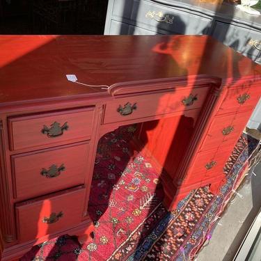 Red painted 7 drawer desk. 45.5” x 18” x 30”