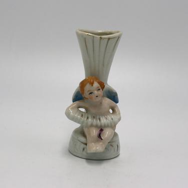vintage cherub bud vase 