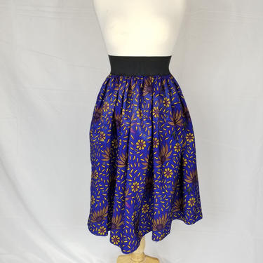 Ankara silk tea-length skirt with invisible pockets (Blue with yellow petals) 