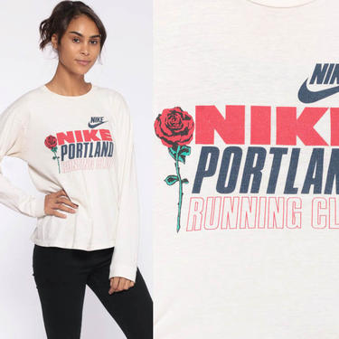 Nike run club shirt best sale