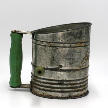 vintage Bromwell sifter with green wood handles 