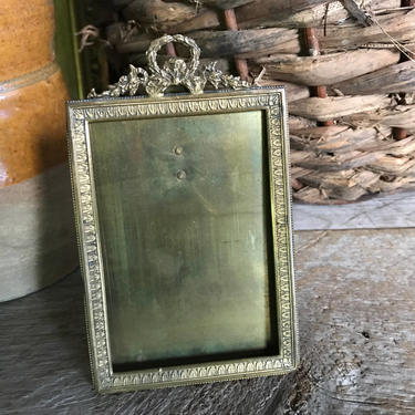 Old French glass ribbon frame.