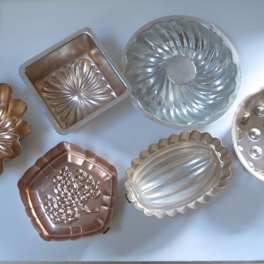 vintage jello molds, ring mold collection copper aluminum pans kitchen wall  hanging