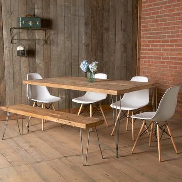 Modern dining table with reclaimed wood top and Hairpin legs. 60" L x 30"W x 30" tall, seats 4-6 people. 1.5" thick top 