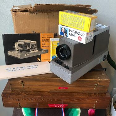 Vintage Bell and Howell Slide Projector with at least 2000 Slides 