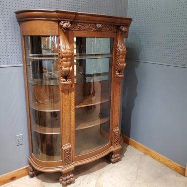 Turn of the Century Antique Carved Griffin China Cabinet in the Style of R.J. Horner