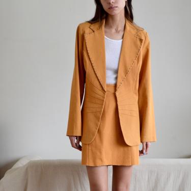 marigold denim blazer and mid length skirt set with rhinstone embellishments 