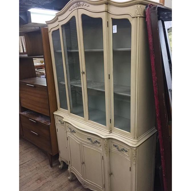 french provincial-style cream-colored 1950's china cabinet/break