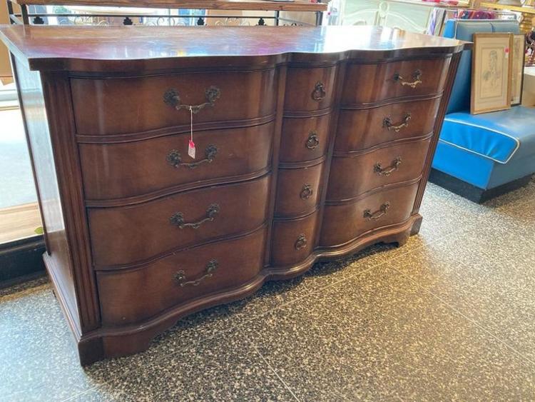12 drawer mahogany dresser.  62.5” x 21.25” x 35”