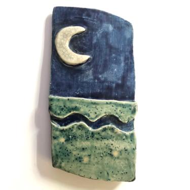 Unique Moon and Ocean Ceramic Wall Art Plaque is hand built with crackle and blue glaze 3.25” W x 6” H 