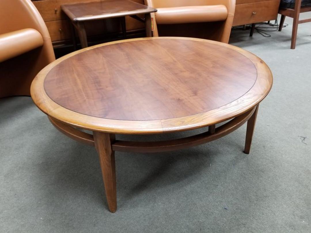 Mid-Century Modern round walnut coffee table by Lane from Peg Leg