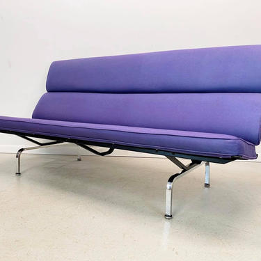 authentic Herman Miller Charles Eames “compact sofa” upholstered in a grape chenille 