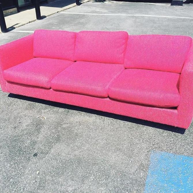 Hot pink Mid Century sofa. 900 from Wishbone Reserve of Baltimore, MD