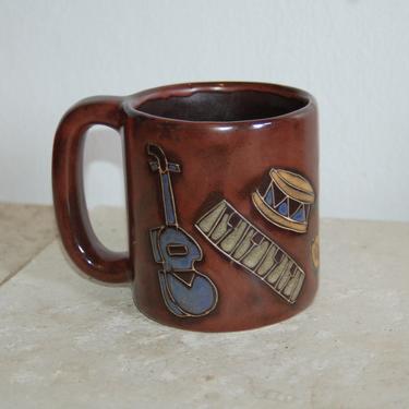 Dancing Musical Instruments, Guitar, Keyboard, Drum, Saxophone ~ large Mara Mexico 20 oz. Pottery Mug ~ Mara Chocolate Brown ~ Pictorial Mug 