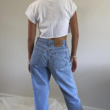 80s Levis jeans / vintage Levis 550 light wash faded denim jeans