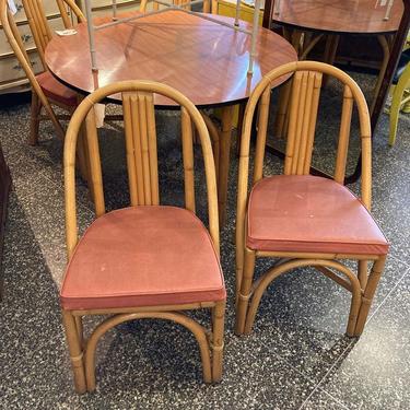 Bamboo chairs. Cushions not perfect. 4 available 18” x17.5” x 32” seat height 17.5”