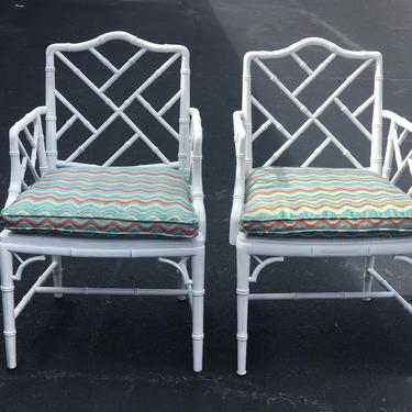 Vintage pair of faux bamboo chairs with cane seats 