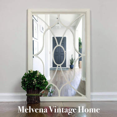 Upcycled mirror made from vintage cabinet door 