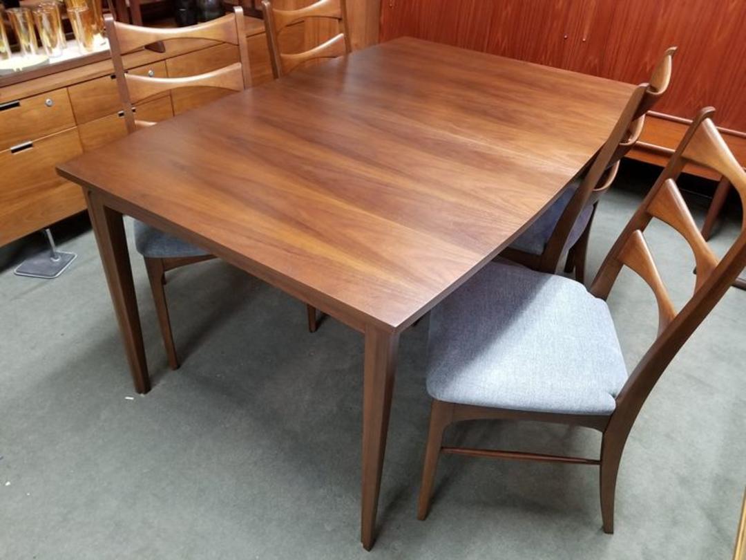 MidCentury Modern boatshaped walnut dining table Peg Leg Vintage