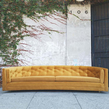 Vintage reupholstered gold tufted half moon sofa 