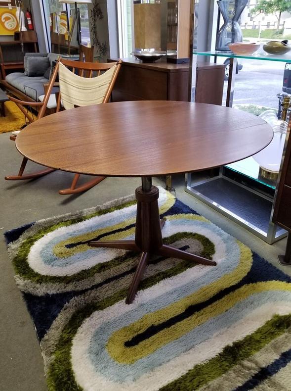 MidCentury Modern game table converts from coffee height to dining