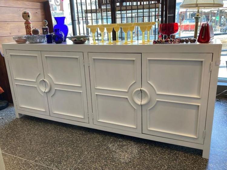 White painted credenza Shelves are stationary. 90.25” x 16”