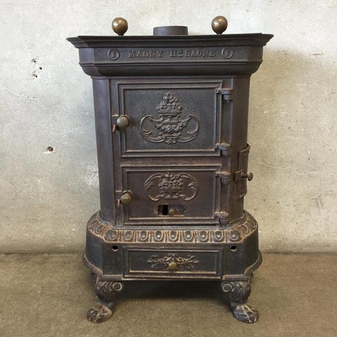 Late 1800s Cast Iron Stove by Romantic at 1stDibs