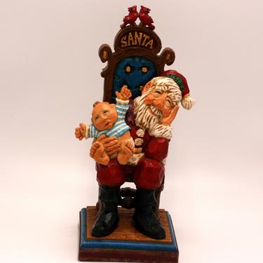 vintage Santa Claus with squirming baby/resin Santa Claus 
