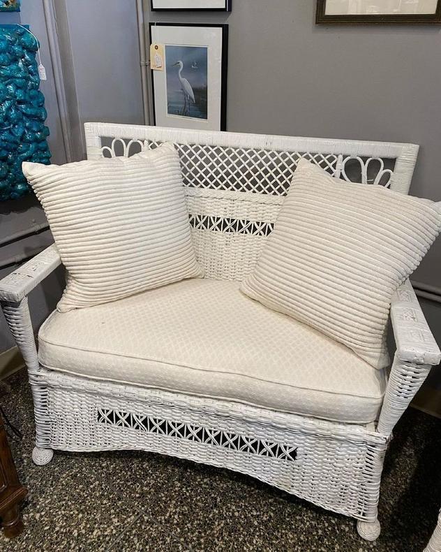 White wicker loveseat with pillows, 40”L x 21”W x 35”T Miss Pixies