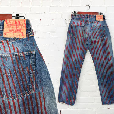 Levi red hot sale stripe jeans