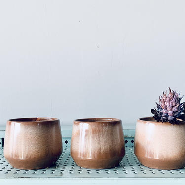 5-piece collection of vintage studio pottery in warm earthy tones