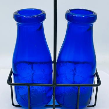 Vintage Pair of Cobalt Blue Milk Bottles &amp;quot;A Bottle of Milk Is A Bottle of Health&amp;quot;  Pint 7.5” With Black Metal Carrier 