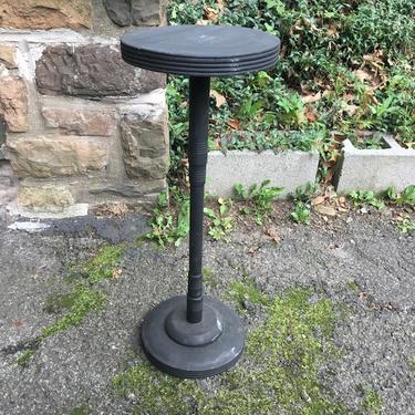 black round wooden plant stand