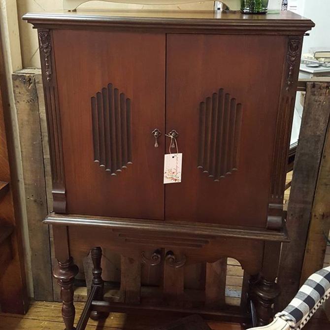 An Old Radio Cabinet Doors Wrap Around To The Sides Making This