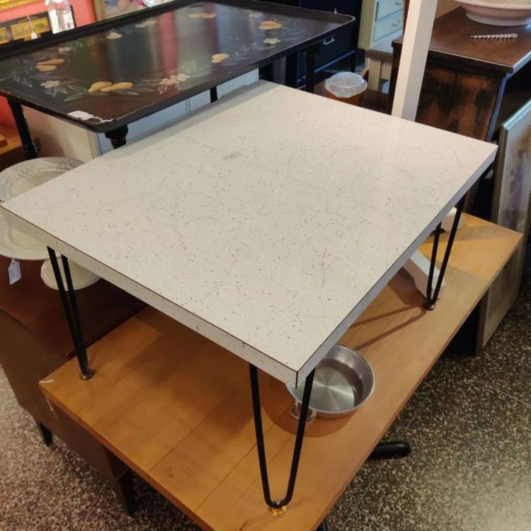 Mid century Formica topped coffee table with hair pin legs. 28.5" x 23.5" x 17.5"