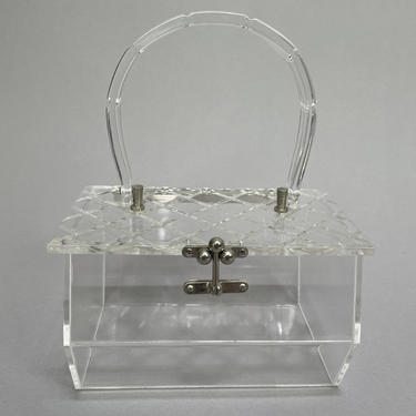 Clear lucite purse sale