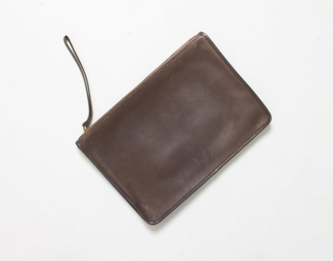 black leather wristlet clutch bag