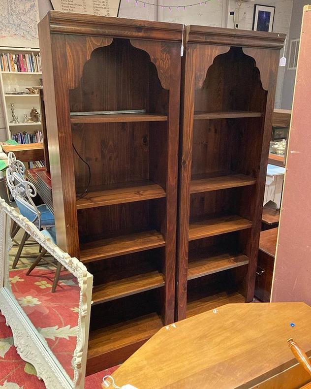 Dark pine arch top bookcases. 24” wide, 13” deep, 72” tall. Miss