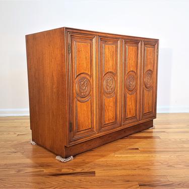 Mid Century Cabinet with Carved Detailed Bifold Doors 